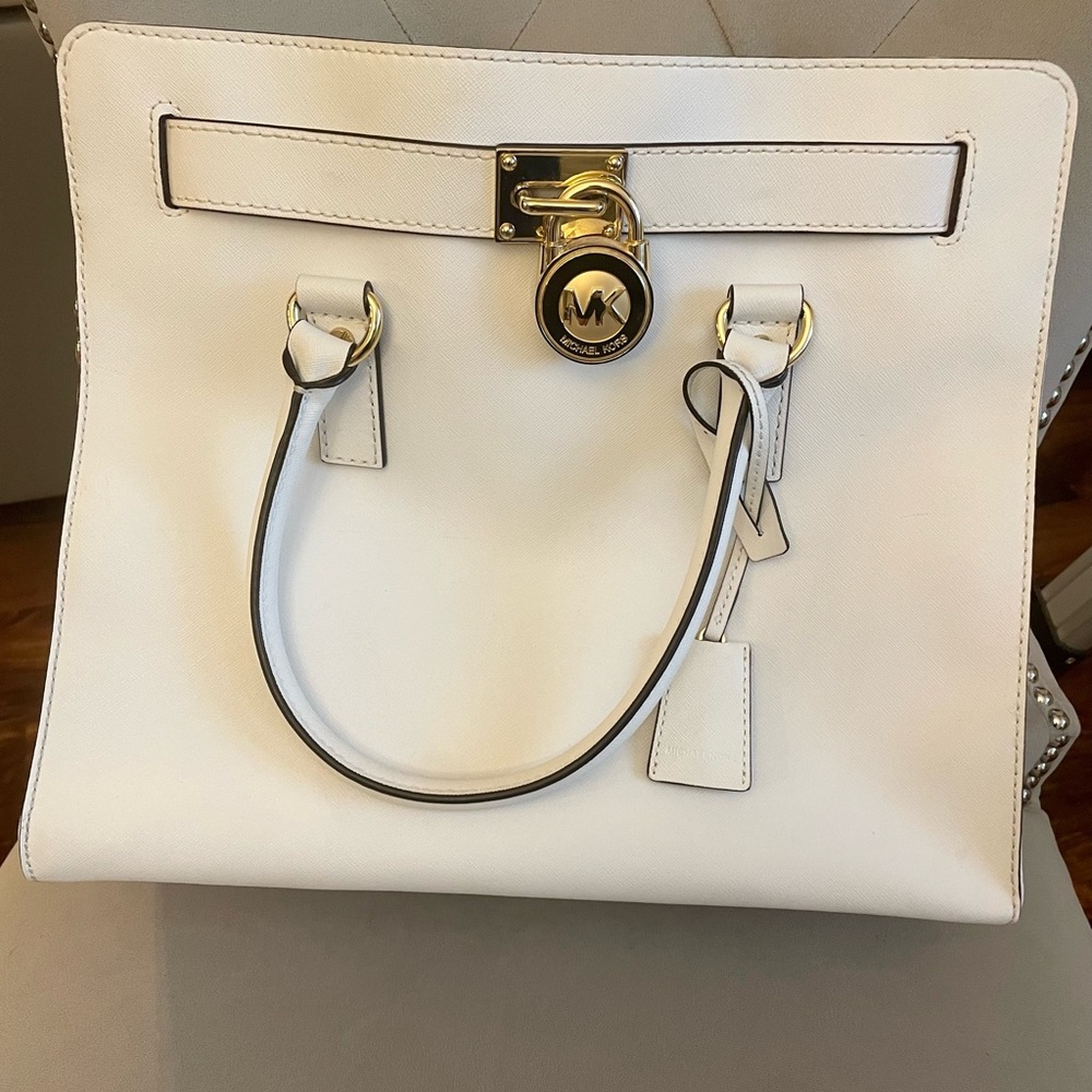 White Michael Kors shoulder bag. Used but in new condition. Smoke free home.